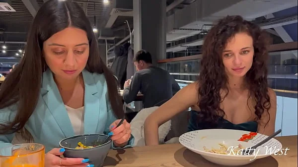 Two shameless chicks have lunch without panties at the mall in public