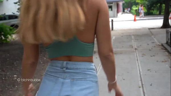 Bouncing her tits in the green top